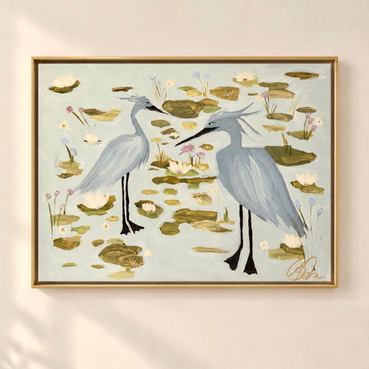 “Heron Play” 40x30 framed in gold floating frame